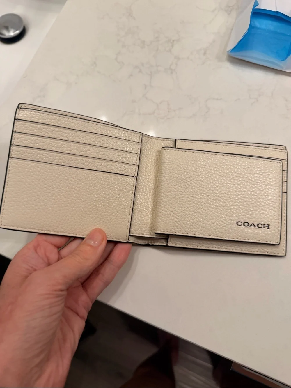 Coach Men’s Pebbled Leather Bifold Wallet — Cream